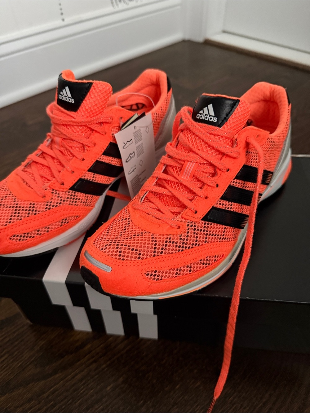 adidas Neon Orange Athletic Sneakers with Black Stripes
